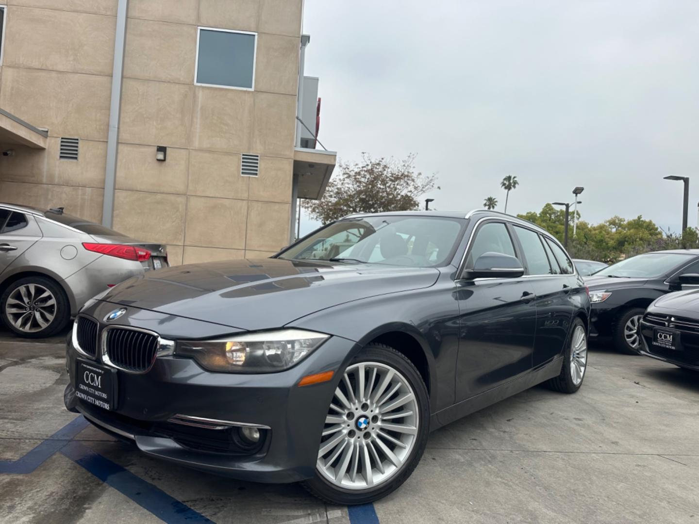 2014 Grey /Black BMW 3-Series Sport Wagon Leather (WBA3K5C53EK) with an 2.0 engine, Automatic transmission, located at 30 S. Berkeley Avenue, Pasadena, CA, 91107, (626) 248-7567, 34.145447, -118.109398 - Diesel!! MPG!! X-Drive!! - Photo#0